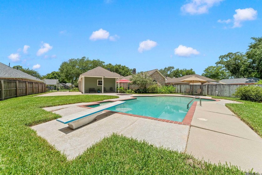 In-ground pool, wood-burning fireplace, boat port, sunroom - photo 28