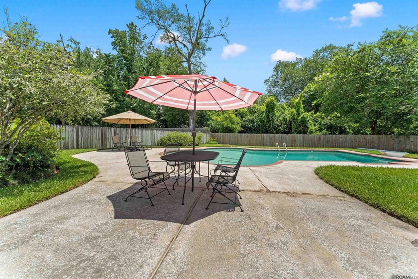 In-ground pool, wood-burning fireplace, boat port, sunroom - photo 29