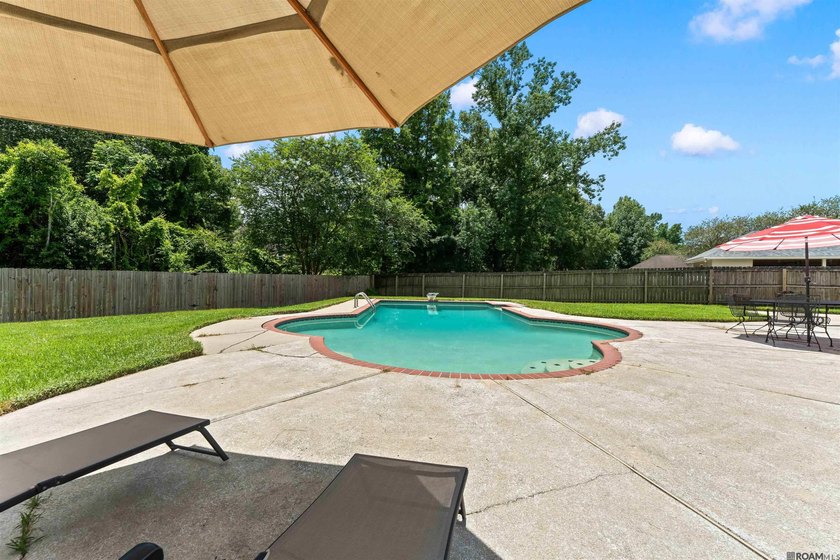 In-ground pool, wood-burning fireplace, boat port, sunroom - photo 30