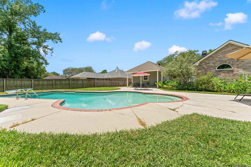 In-ground pool, wood-burning fireplace, boat port, sunroom - photo 31
