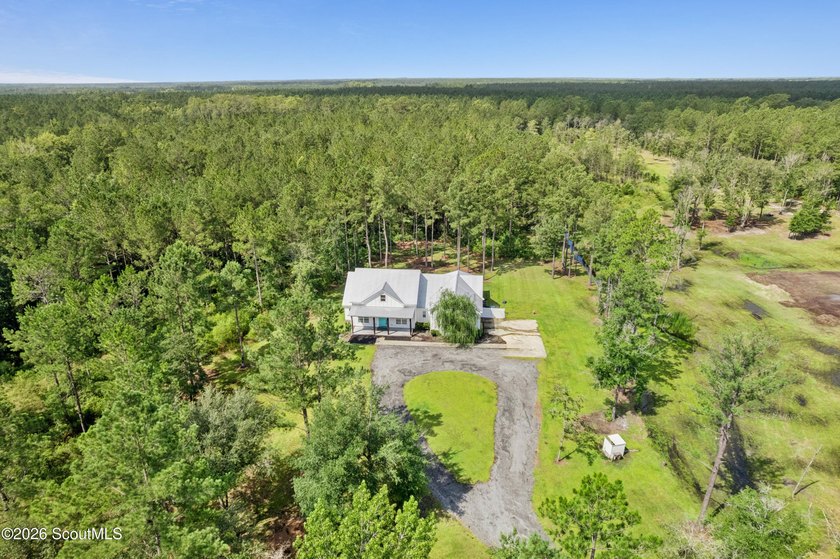Discover a Modern Farmhouse situated on 6.67 acres, boasting - photo 3