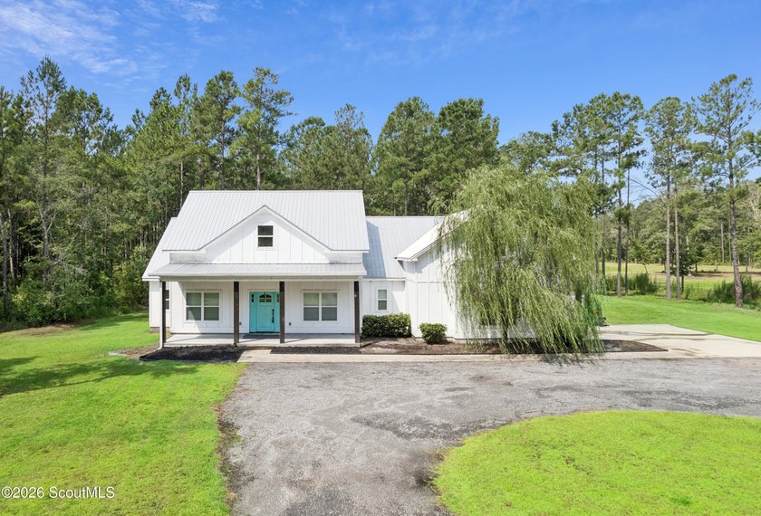 Discover a Modern Farmhouse situated on 6.67 acres, boasting - photo 8