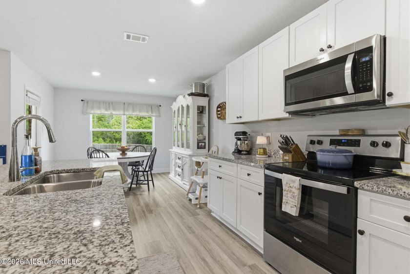 If you've been waiting for the perfect 4-bedroom home with a - photo 11