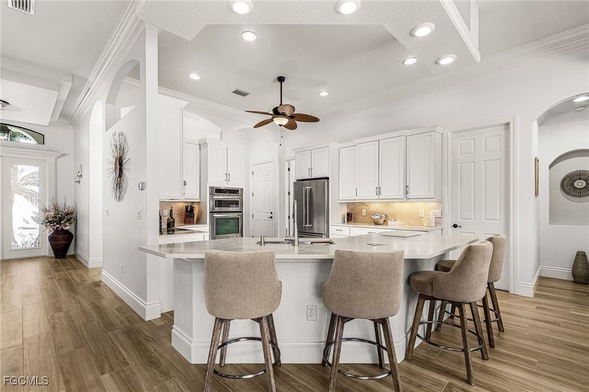 Price Improved! Luxury lakefront living meets breathtaking golf - photo 8