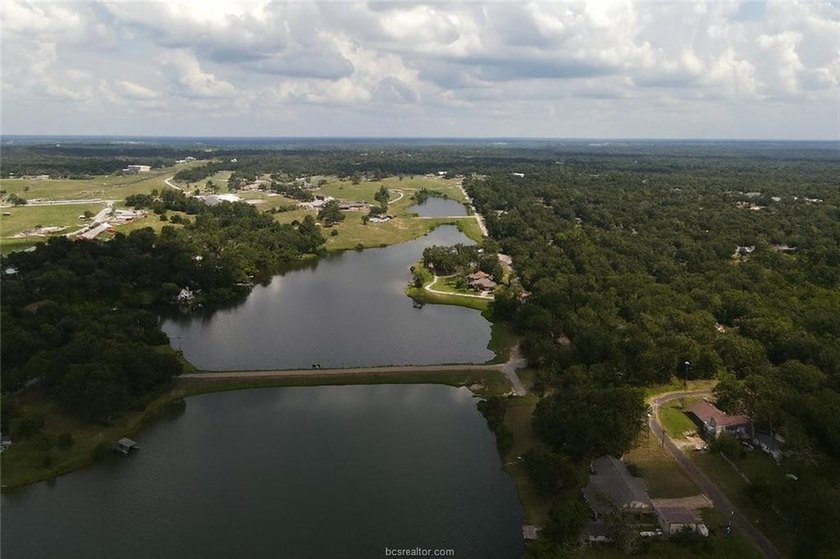 BUILDABLE lot just over half an acre in Hilltop Lakes. The - photo 8