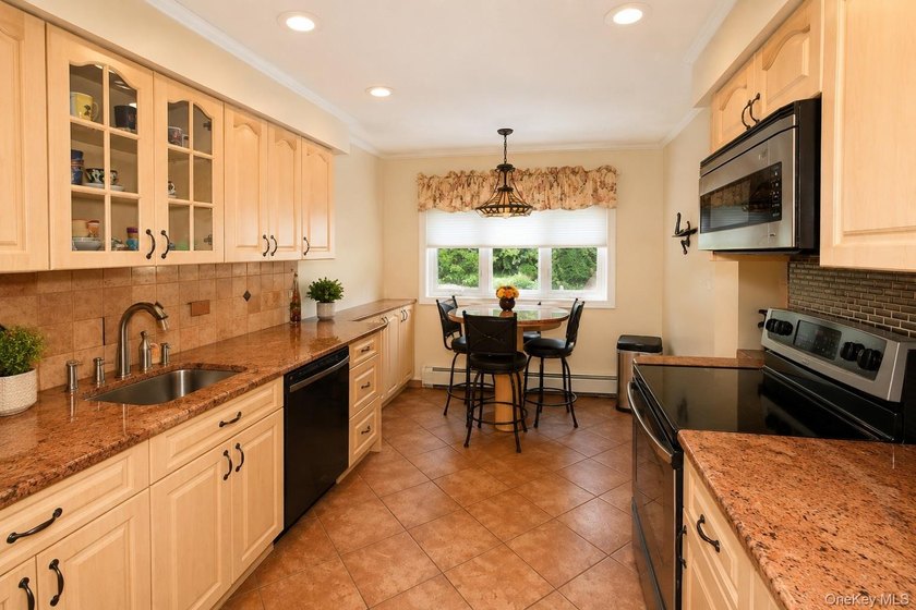 Opportunity awaits in this beautifully maintained multi level - photo 6