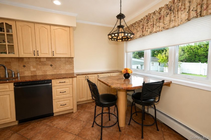 Opportunity awaits in this beautifully maintained multi level - photo 8