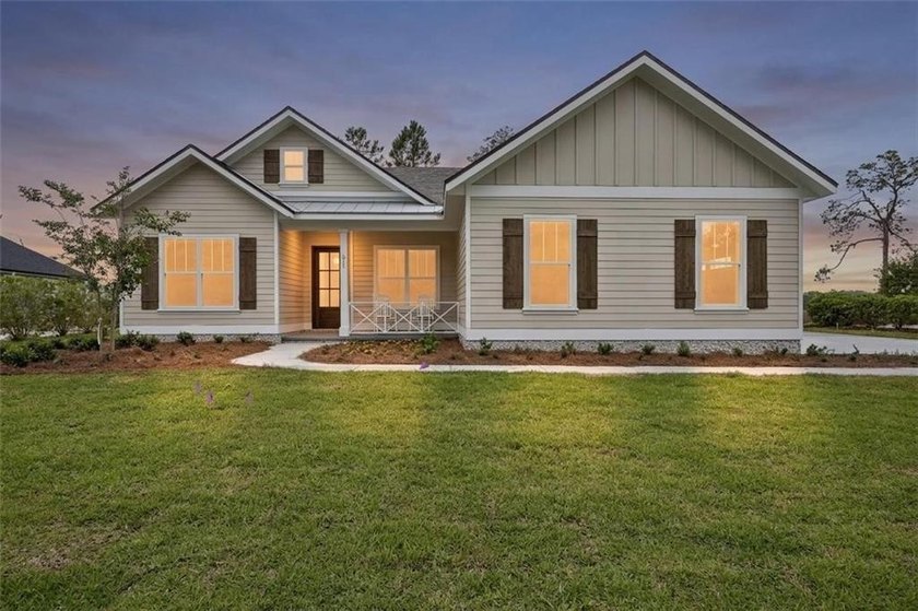 NEWLY COMPLETED AND BEAUTIFULLY DESIGNED, THIS 4-BEDROOM, 3-BATH - photo 2