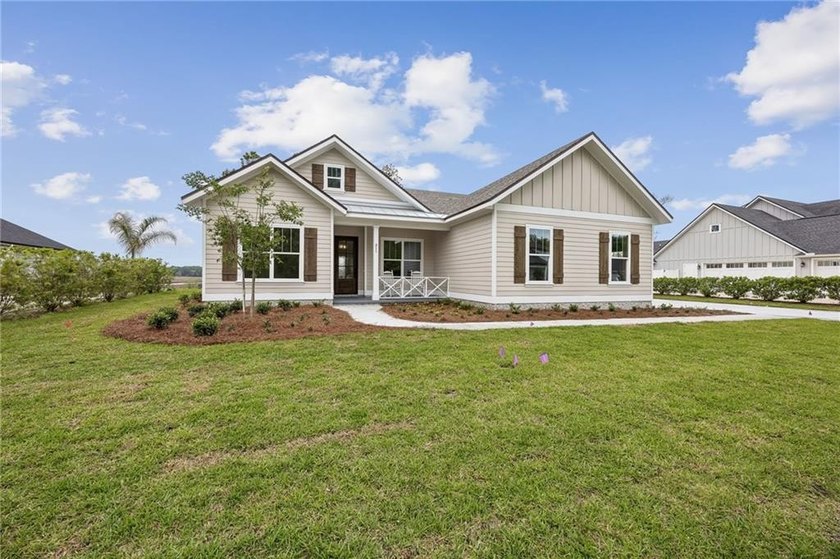 NEWLY COMPLETED AND BEAUTIFULLY DESIGNED, THIS 4-BEDROOM, 3-BATH - photo 3