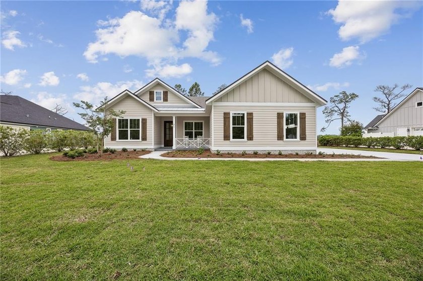 NEWLY COMPLETED AND BEAUTIFULLY DESIGNED, THIS 4-BEDROOM, 3-BATH - photo 5