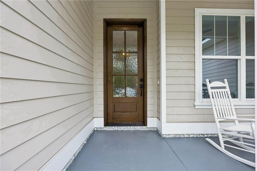 NEWLY COMPLETED AND BEAUTIFULLY DESIGNED, THIS 4-BEDROOM, 3-BATH - photo 8