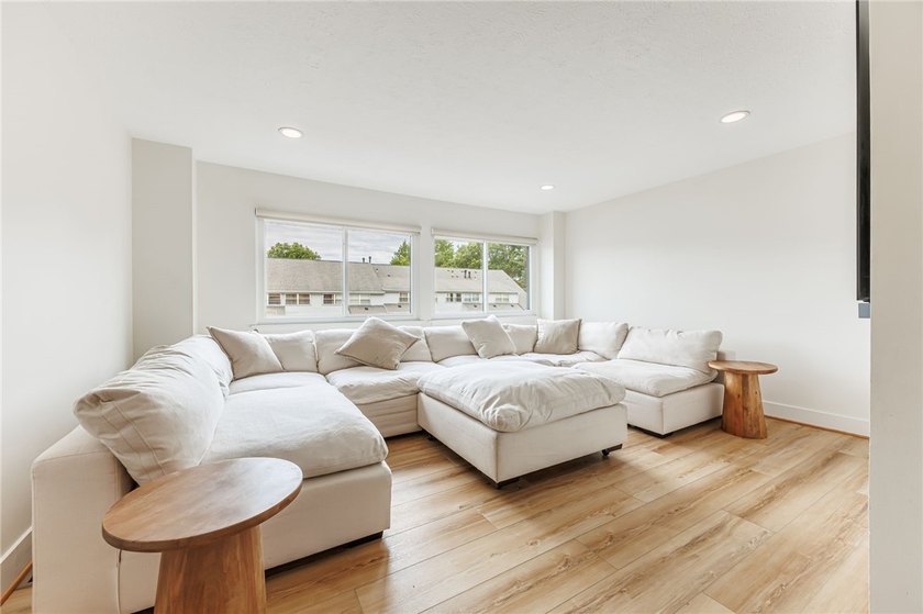 Wow! Incredible updates throughout! Tri-level living. Each of - photo 4