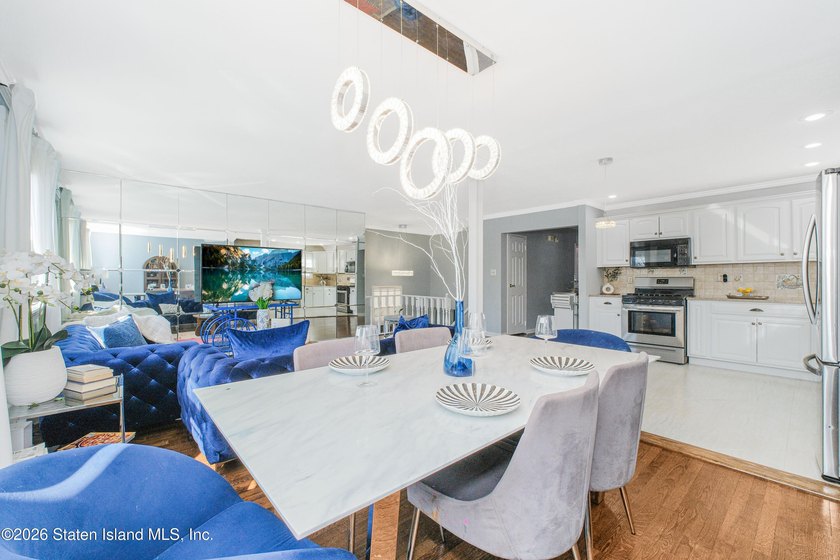Welcome to 191 Suffolk Avenue, a warm and inviting two-family - photo 6