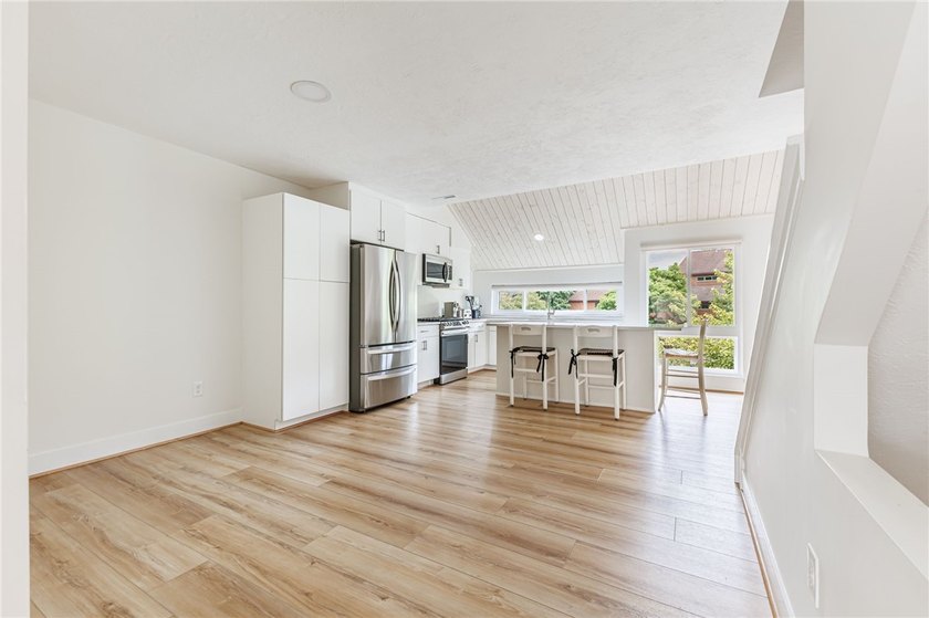 Wow! Incredible updates throughout! Tri-level living. Each of - photo 7