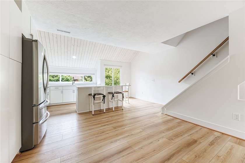 Wow! Incredible updates throughout! Tri-level living. Each of - photo 8