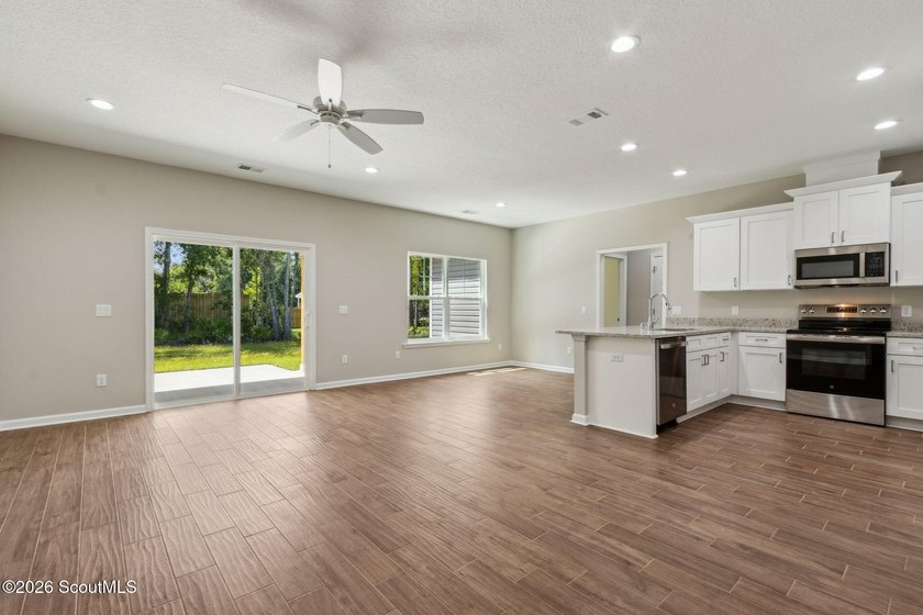MOVE IN READY NEW CONSTRUCTION ON OVER HALF AN ACRE WITH NO CITY - photo 3