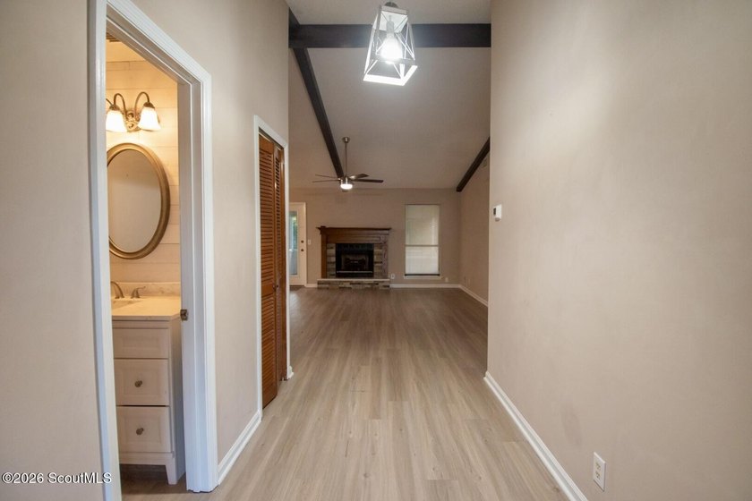 Take a fresh look! This spacious former model home now features - photo 3