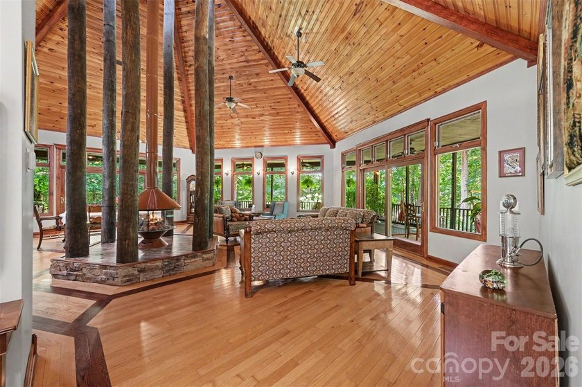 Tucked away on over 4 private wooded acres in the desirable - photo 6