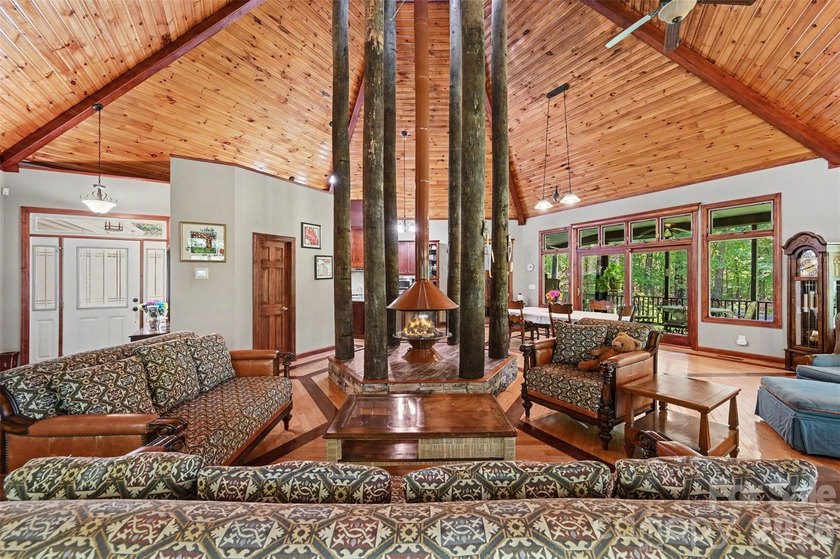 Tucked away on over 4 private wooded acres in the desirable - photo 8