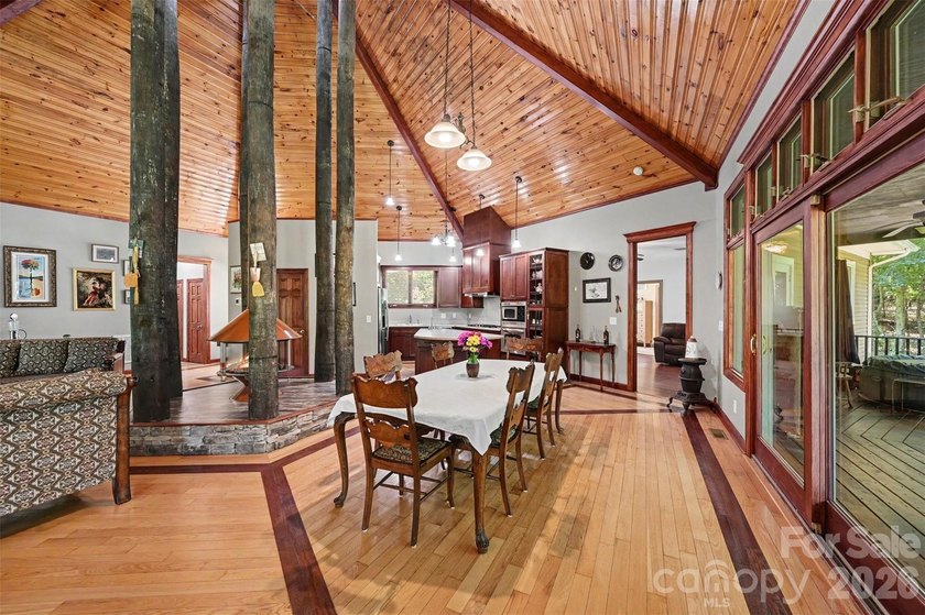 Tucked away on over 4 private wooded acres in the desirable - photo 9