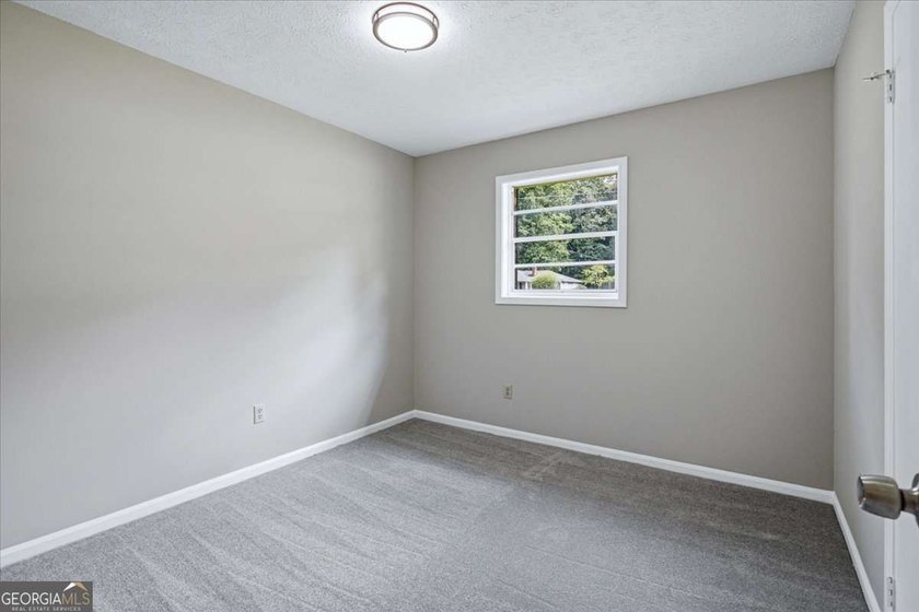 Beautifully renovated, 4 sided brick ranch on nearly 1/2 acre - photo 9