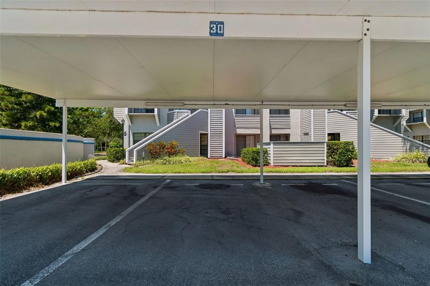 Door to door covered parking. No lugging groceries upstairs - photo 3