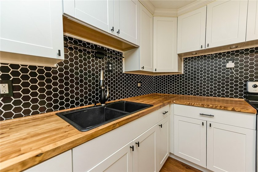 Welcome to 441 Benton Street! This Cape Cod style home located - photo 9