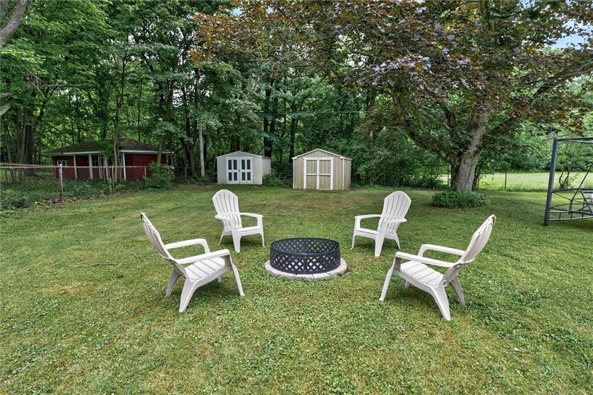 Welcome to 33 Greenbriar Dr in Gates. This Massive ranch is just - photo 6