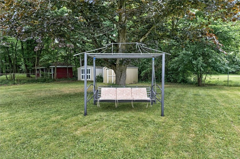 Welcome to 33 Greenbriar Dr in Gates. This Massive ranch is just - photo 7