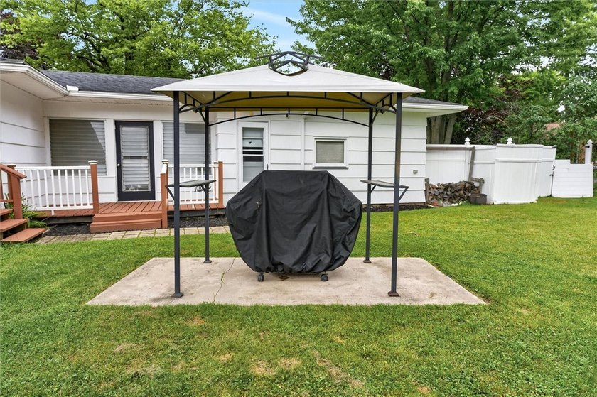Welcome to 33 Greenbriar Dr in Gates. This Massive ranch is just - photo 8