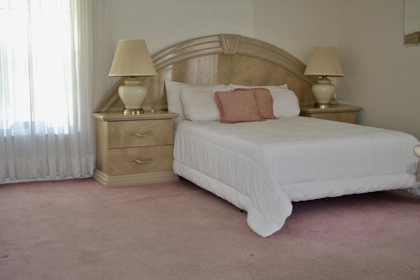 Welcome to this desirable 55+ community End-unit villa in the - photo 11