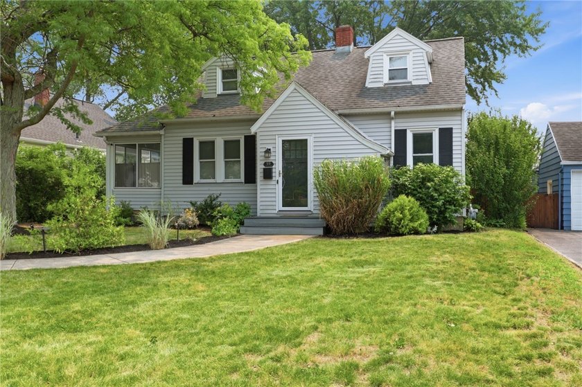 Step into this stunning, fully updated 1940s Cape Cod in the - photo 3