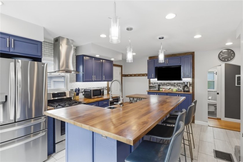 Step into this stunning, fully updated 1940s Cape Cod in the - photo 4