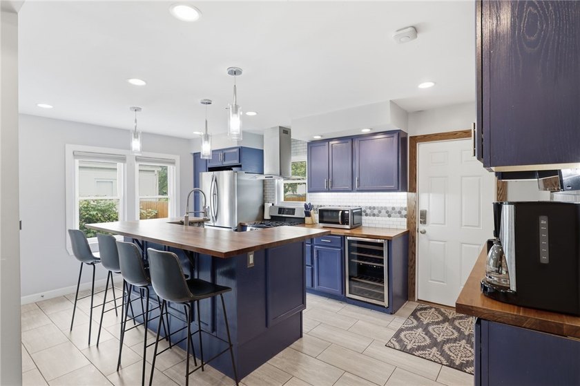 Step into this stunning, fully updated 1940s Cape Cod in the - photo 6