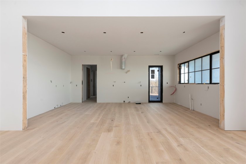 Perched high above Lake Toxaway, this exquisite new-construction - photo 6