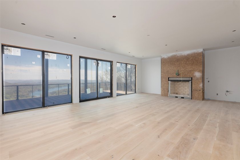 Perched high above Lake Toxaway, this exquisite new-construction - photo 8