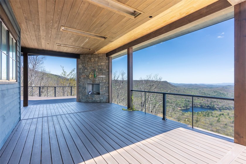 Perched high above Lake Toxaway, this exquisite new-construction - photo 10