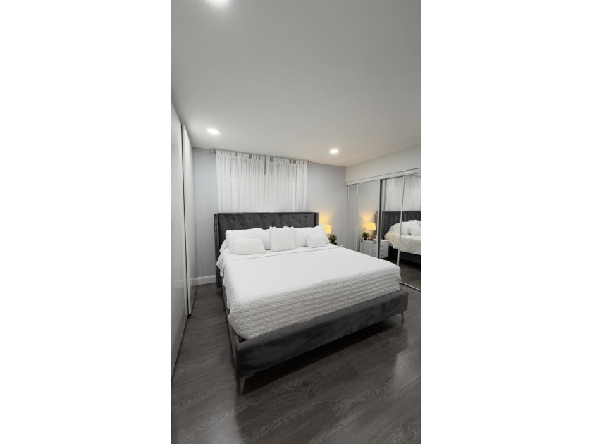 Bright and inviting 1-bedroom, 1.5-bath condo located less than - photo 11