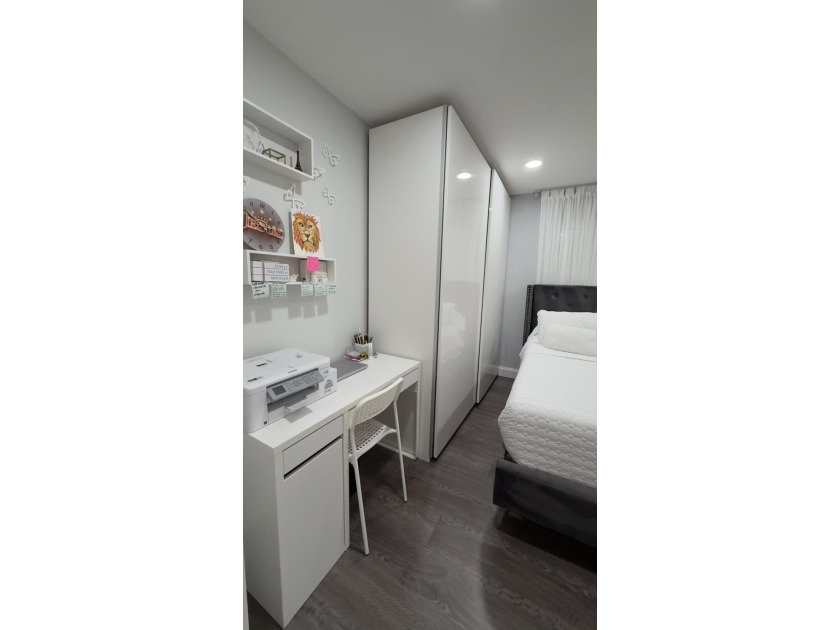 Bright and inviting 1-bedroom, 1.5-bath condo located less than - photo 12