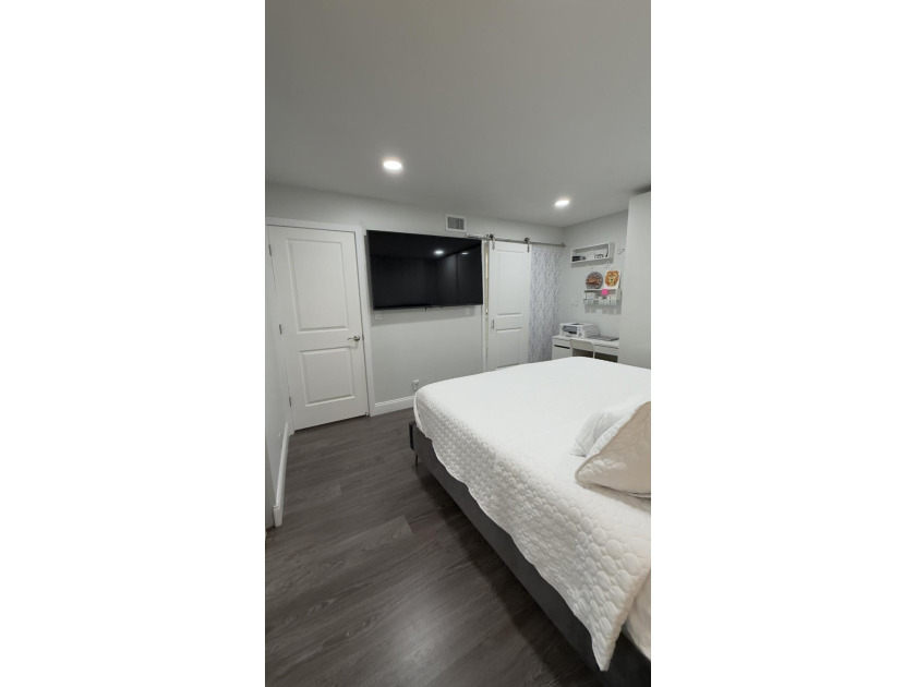 Bright and inviting 1-bedroom, 1.5-bath condo located less than - photo 13