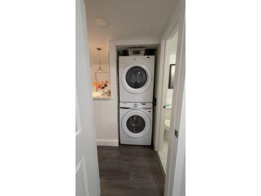 Bright and inviting 1-bedroom, 1.5-bath condo located less than - photo 15