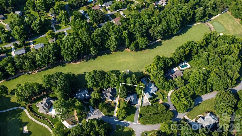Perfectly situated on the 13th fairway of the prestigious Cramer - photo 2