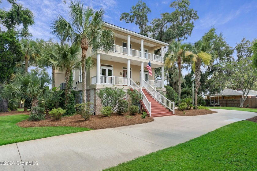 Your coastal oasis awaits! Exceptionally maintained custom-built - photo 3