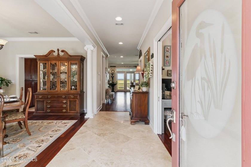 Your coastal oasis awaits! Exceptionally maintained custom-built - photo 8