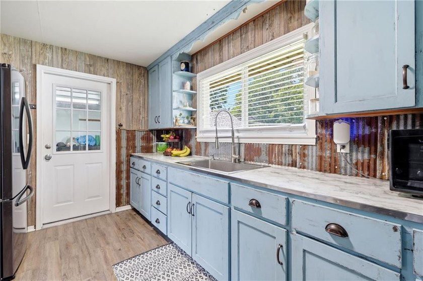 Welcome home to this charming 2-bedroom, 1-bath home in the - photo 12