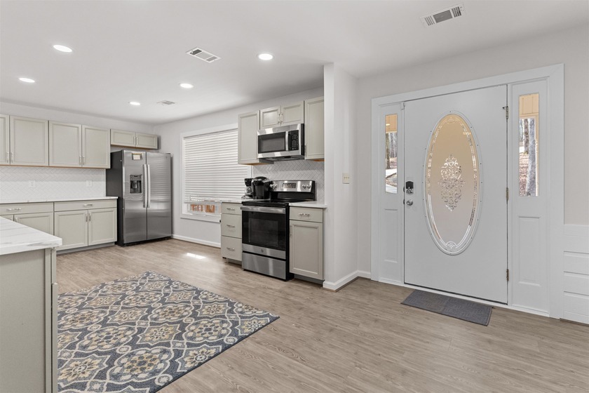 Experience refined lakefront living in this exceptional Lake - photo 18