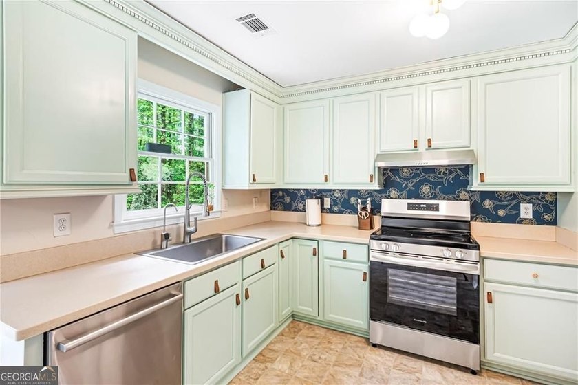 Step into this beautifully refreshed split-level home, ready and - photo 14