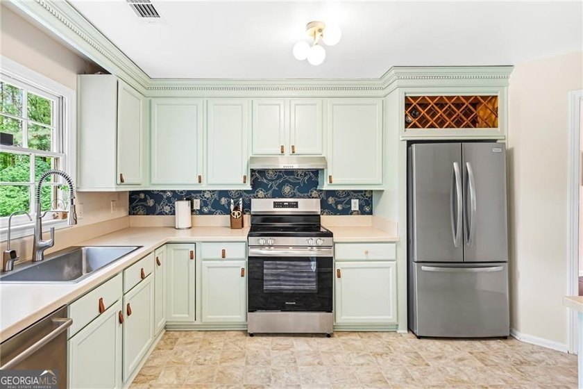 Step into this beautifully refreshed split-level home, ready and - photo 15