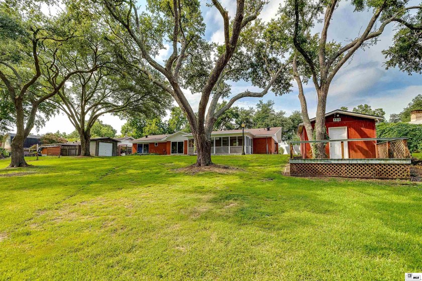 Experience peaceful bayou front living in this beautiful - photo 36