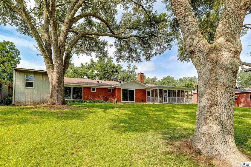 Experience peaceful bayou front living in this beautiful - photo 37